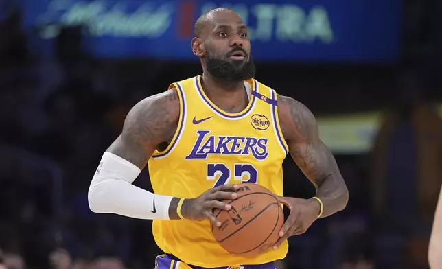FILE - Los Angeles Lakers forward LeBron James appears during the first half of an NBA basketball game against the Utah Jazz, on Feb. 10, 2025, in Los Angeles. (AP Photo/Mark J. Terrill, File)