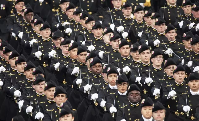 Cadets from the elite engineers school Polytechnique march on the Champs-Elysees avenue during the Bastille Day parade, Monday, July 14, 2025 in Paris. (AP Photo/Christophe Ena)
