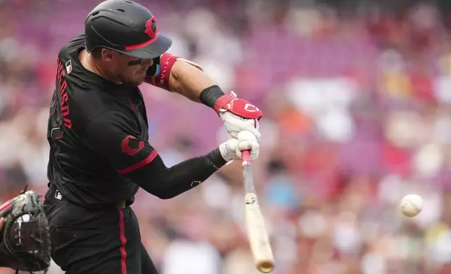 Cincinnati Reds' Tyler Stephenson hits a solo home run during the second inning of a baseball game against the Tampa Bay Rays, Friday, July 25, 2025, in Cincinnati. (AP Photo/Jeff Dean)
