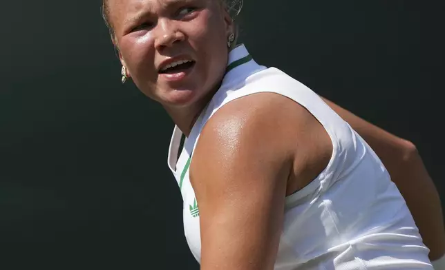 Russia's Diana Shnaider returns to Moyuka Uchijima of Japan in their first round women's singles match at the Wimbledon Tennis Championships in London, Monday, June 30, 2025. (AP Photo/Joanna Chan)