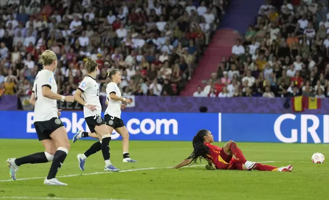 Germany players watch as Spain's Salma Paralluelo fails to connect with the ball in front of the goal during the Women's Euro 2025 semifinals soccer match between Germany and Spain at Stadion Letzigrund in Zurich, Switzerland, Wednesday, July 23, 2025. (AP Photo/Alessandra Tarantino)