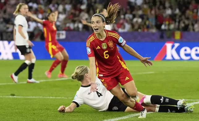 Spain's Aitana Bonmati celebrates after scoring the opening goal during the Women's Euro 2025 semifinals soccer match between Germany and Spain at Stadion Letzigrund in Zurich, Switzerland, Wednesday, July 23, 2025. (AP Photo/Alessandra Tarantino)