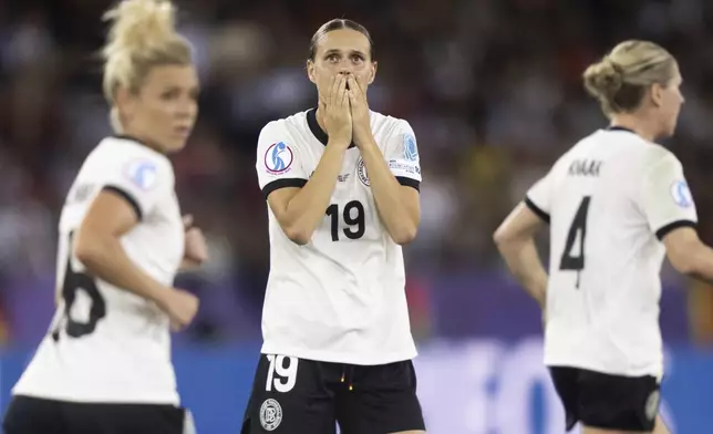 Germany's Klara Buehl reacts after a free kick during the Women's Euro 2025 semifinal soccer match between Germany and Spain at the Letzigrund stadium in Zurich, Switzerland, Wednesday, July 23, 2025. (Til Buergy/Keystone via AP)