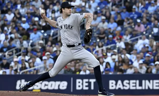 New York Yankees pitcher Cam Schlittler (31) throws to a Toronto Blue Jays batter during the first inning of a baseball game in Toronto on Tuesday, July 22, 2025. (Jon Blacker/The Canadian Press via AP)