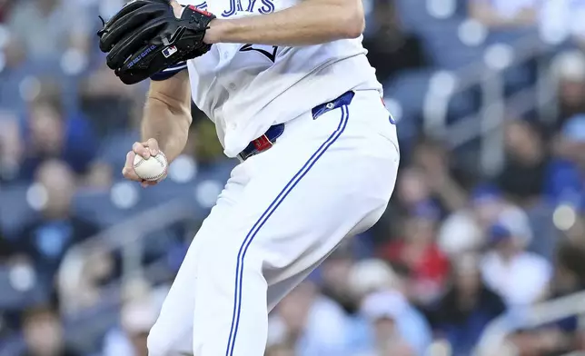 Toronto Blue Jays starting pitcher Max Scherzer delivers to a New York Yankees batter during the first inning of a baseball game in Toronto on Tuesday, July 22, 2025. (Jon Blacker/The Canadian Press via AP)
