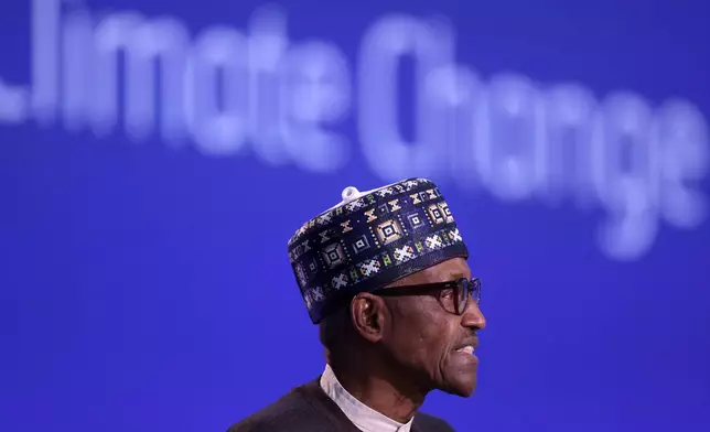 FILE - Nigeria's President Muhammadu Buhari speaks during the UN Climate Change Conference COP26 in Glasgow, Scotland, Tuesday, Nov. 2, 2021. (Adrian Dennis/Pool Photo via AP, File)
