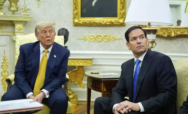 President Donald Trump and Secretary of State Marco Rubio listen during a meeting with Bahrain's Crown Prince Salman bin Hamad Al Khalifa in the Oval Office of the White House, Wednesday, July 16, 2025, in Washington. (AP Photo/Alex Brandon)