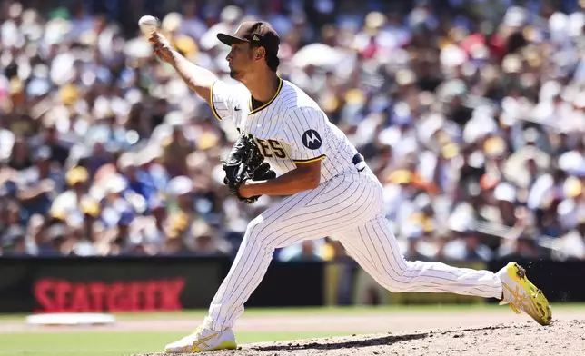 San Diego Padres' Yu Darvish works against the New York Mets in the sixth inning of a baseball game, Wednesday, July 30, 2025, in San Diego. (AP Photo/Derrick Tuskan)