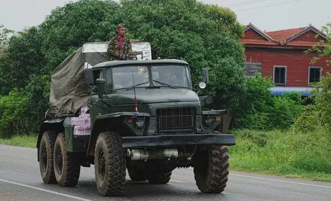 A Cambodian military vehicle carries rocket launcher in Oddar Meanchey province, Cambodia, Saturday, July 26, 2025, as border fighting between Thailand and Cambodia entered its third day, heightening fears of an extended conflict. (AP Photo/Heng Sinith)