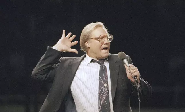 FILE - The Rev. Jimmy Swaggart gestures as he preaches the Gospel to the nearly 14,000 faithful who attended his Los Angeles Crusade in the Sports Arena, Sunday, March 29, 1987. (AP Photo/Mark Avery, file)
