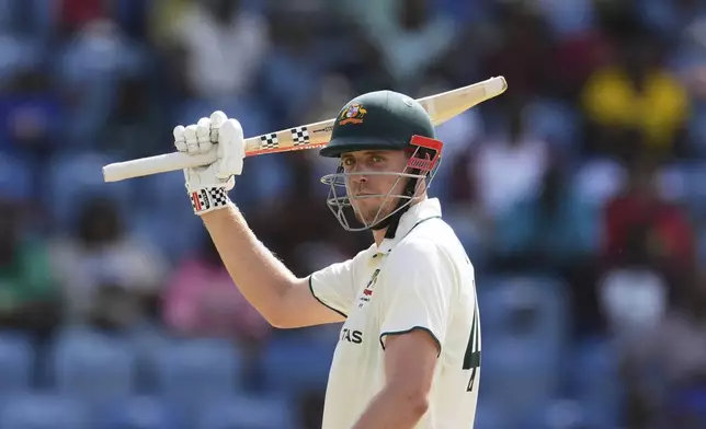 Australia's Cameron Green celebrates scoring a half-century against West Indies on day three of the second cricket Test match at the National Cricket Stadium in St. George's, Grenada, Saturday, July 5, 2025. (AP Photo/Ricardo Mazalan)