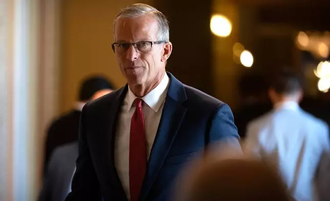 Senate Majority Leader John Thune, of S.D., walks toward the Senate chamber at the Capitol, Wednesday, July 16, 2025, in Washington. (AP Photo/Mark Schiefelbein)