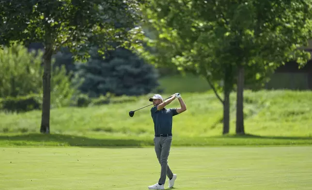 Adam Svensson hits from the 12th fairway during the first round of the 3M Open golf tournament at the Tournament Players Club Thursday, July 24, 2025, in Blaine, Minn. (AP Photo/Abbie Parr)