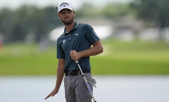 Adam Svensson reacts to his putt on the 18th hole during the first round of the 3M Open golf tournament at the Tournament Players Club Thursday, July 24, 2025, in Blaine, Minn. (AP Photo/Abbie Parr)