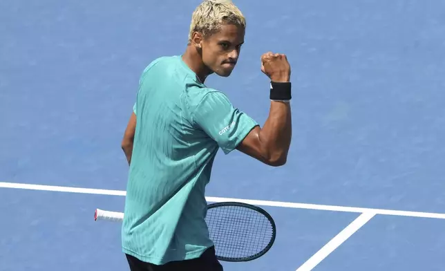 Gabriel Diallo, of Canada reacts during a match against against Matteo Gigante, of Italy, at the National Bank Open men’s tennis tournament, Wednesday, July 30, 2025, in Toronto. (Nathan Denette/The Canadian Press via AP)