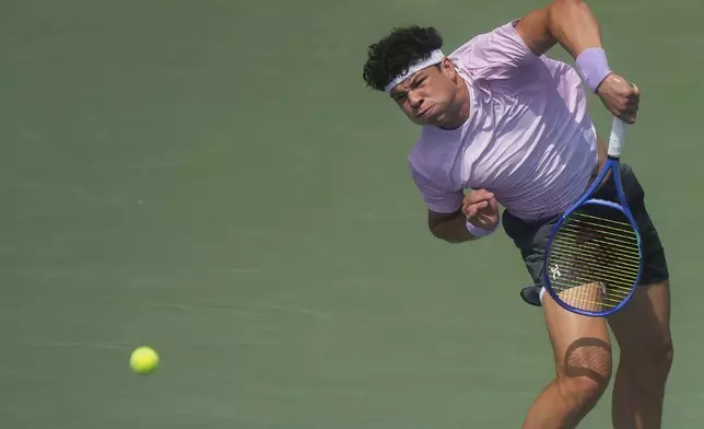 Ben Shelton, of the United States, serves against Adrian Mannarino of France during a match at the National Bank Open men’s tennis tournament, Wednesday, July 30, 2025, in Toronto. (Nathan Denette/The Canadian Press via AP)