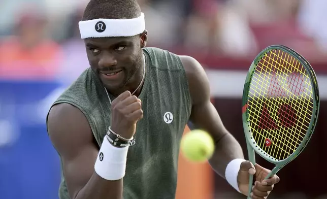 Frances Tiafoe of the United States reacts after winning the second set against Yosuke Watanuki of Japan during their match at the National Bank Open in Toronto on Wednesday July 30, 2025. (Frank Gunn/The Canadian Press via AP)