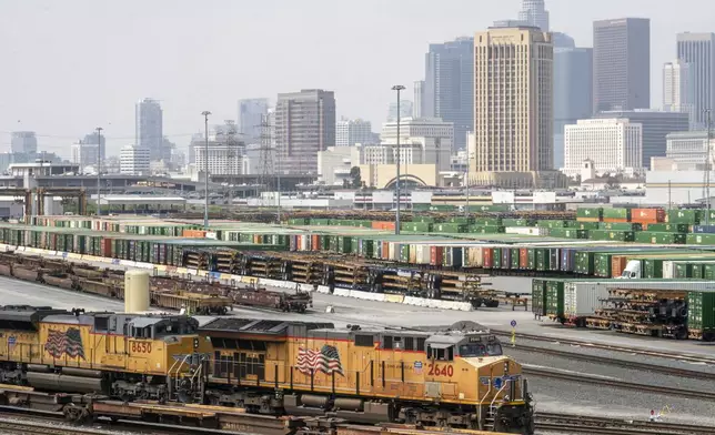 FILE - Los Angeles skyline is seen above the Union Pacific LATC Intermodal Terminal is seen on Tuesday, April 25, 2023 in Los Angeles. (AP Photo/Damian Dovarganes, File)