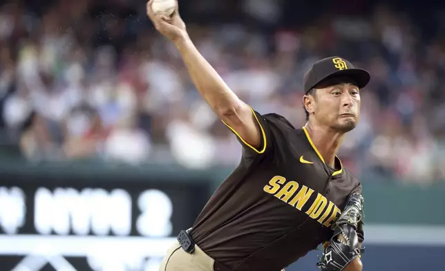 San Diego Padres pitcher Yu Darvish throws during the second inning of a baseball game against the Washington Nationals, Saturday, July 19, 2025, in Washington. (AP Photo/Daniel Kucin Jr.)
