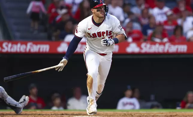 Los Angeles Angels designated hitter Mike Trout drops his bat after hitting a home run during the fifth inning of a baseball game against the Arizona Diamondbacks in Anaheim, Calif., Saturday, July 12, 2025. (AP Photo/Jessie Alcheh)