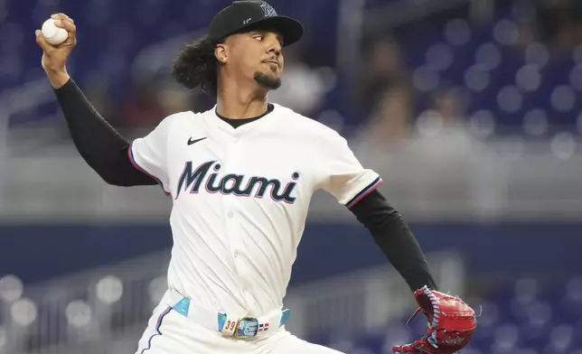 Miami Marlins starting pitcher Eury Perez throws during the first inning of a baseball game against the Minnesota Twins, Thursday, July 3, 2025, in Miami. (AP Photo/Lynne Sladky)