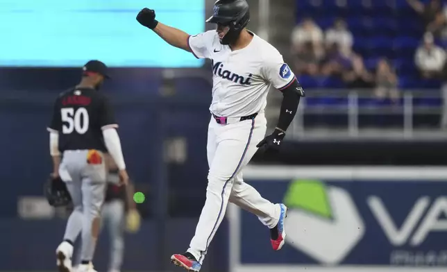 Miami Marlins' Agustin Ramirez runs the bases after hitting a two-run home run during the first inning of a baseball game against the Minnesota Twins, Thursday, July 3, 2025, in Miami. (AP Photo/Lynne Sladky)