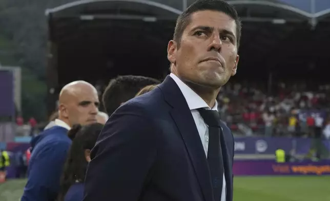 Portugal head coach Francisco Neto concentrates prior the Women's Euro 2025, group B, soccer match between Portugal and Belgium at Stade de Tourbillon in Sion, Switzerland, Friday, July 11, 2025. (AP Photo/Alessandra Tarantino)