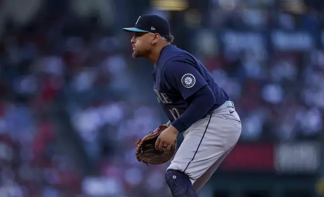 Seattle Mariners first baseman Josh Naylor stands on the field during the second inning of a baseball game against the Los Angeles Angels, Friday, July 25, 2025, in Anaheim, Calif. (AP Photo/Eric Thayer)