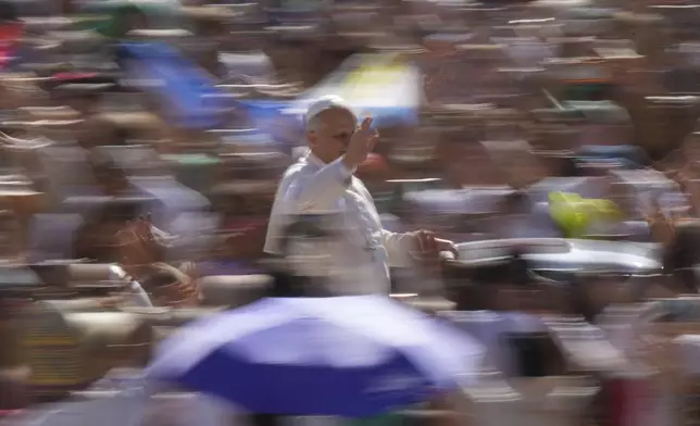 Pope Leo XIV holds his weekly general audience in St. Peter's Square, at the Vatican, Wednesday, July 30, 2025. (AP Photo/Andrew Medichini)