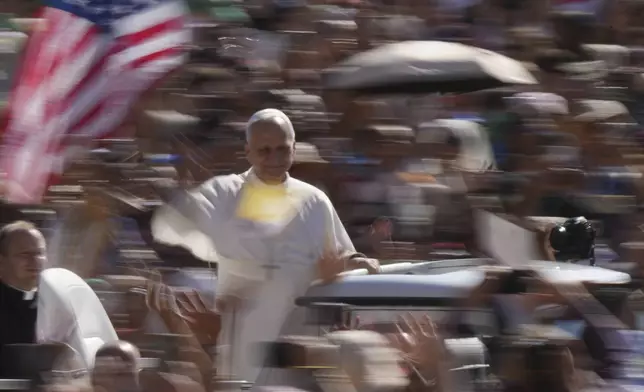 Pope Leo XIV holds his weekly general audience in St. Peter's Square, at the Vatican, Wednesday, July 30, 2025. (AP Photo/Andrew Medichini)