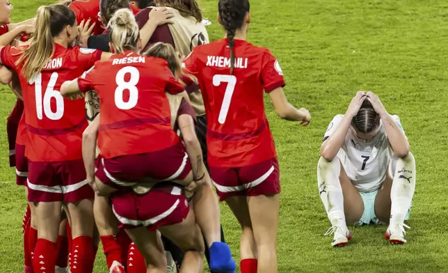 Iceland's Karolina Vilhjalmsdottir , right, reacts at the end of the Euro 2025, group A, soccer match between Switzerland and Iceland at Stadion Wankdorf in Bern, Switzerland, Sunday, July 6, 2025. (Salvatore Di Nolfi/Keystone via AP)