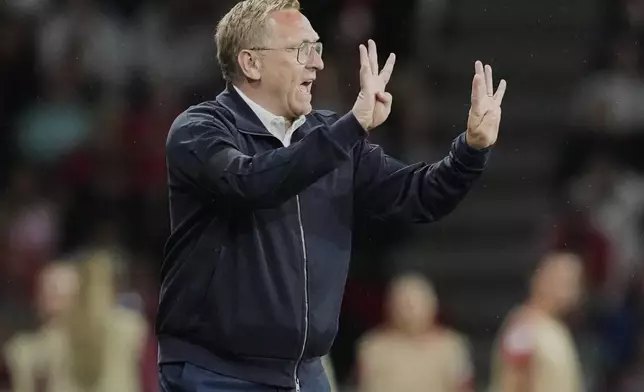 Iceland head coach Thorsteinn Halldorsson gestures during the Euro 2025, group A, soccer match between Switzerland and Iceland at Stadion Wankdorf in Bern, Switzerland, Sunday, July 6, 2025. (AP Photo/Martin Meissner)