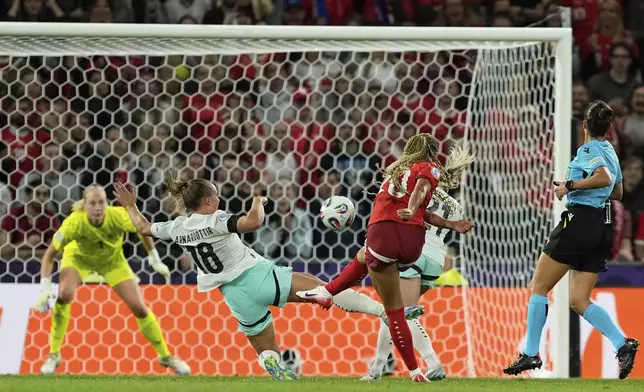 Switzerland's Alayah Pilgrim scores her side's second goal during the Euro 2025, group A, soccer match between Switzerland and Iceland at Stadion Wankdorf in Bern, Switzerland, Sunday, July 6, 2025. (AP Photo/Martin Meissner)