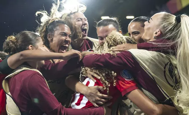 Switzerland players celebrate at the end of the Euro 2025, group A, soccer match between Switzerland and Iceland at Stadion Wankdorf in Bern, Switzerland, Sunday, July 6, 2025. (Til Buergy/Keystone via AP)