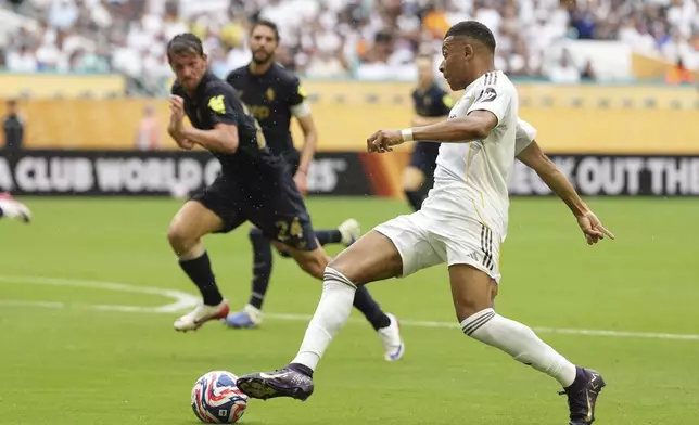 Real Madrid's Kylian Mbappe in action during the Club World Cup round of 16 soccer match between Real Madrid and Juventus in Miami Gardens, Fla., Tuesday, July 1, 2025. (AP Photo/Rebecca Blackwell)