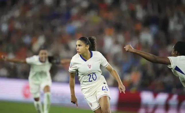 France's Delphine Cascarino celebrates after scoring her side's third goal during the Women's Euro 2025, group D, soccer match between the Netherlands and France at St. Jakob-Park in Basel, Switzerland, Sunday, July 13, 2025. (AP Photo/Alessandra Tarantino)
