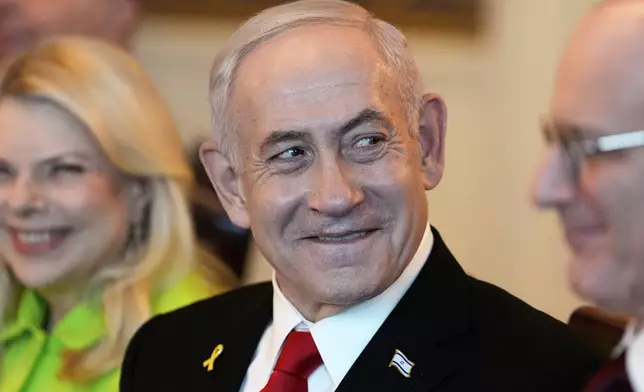 Israel's Prime Minister Benjamin Netanyahu attends a meeting with President Donald Trump in the Blue Room of the White House, Monday, July 7, 2025, in Washington. (AP Photo/Alex Brandon)