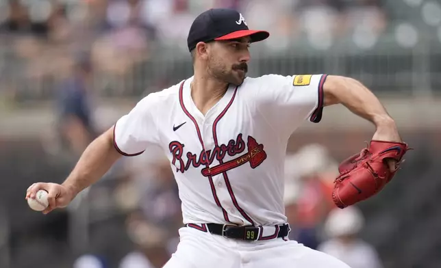 Atlanta Braves pitcher Spencer Strider (99) works against the San Francisco Giants in the first inning of a baseball game, Wednesday, July 23, 2025, in Atlanta. (AP Photo/Mike Stewart)