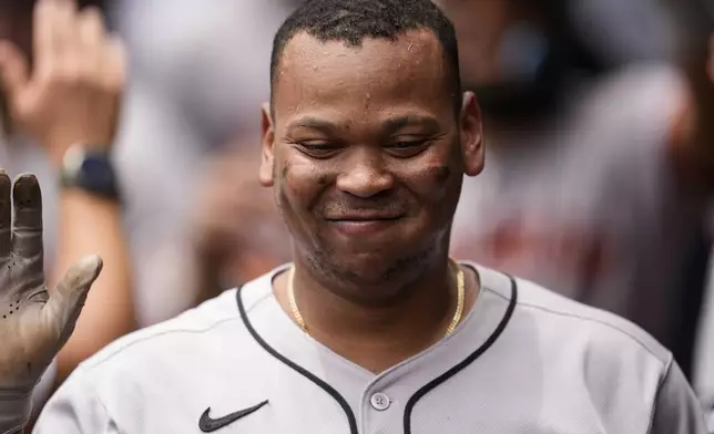 San Francisco Giants designated hitter Rafael Devers (16) celebrates his three-run home run against the Atlanta Braves in the sixth inning of a baseball game, Wednesday, July 23, 2025, in Atlanta. (AP Photo/Mike Stewart)