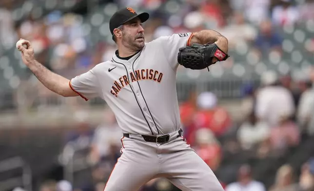 San Francisco Giants pitcher Justin Verlander (35) delivers in the first inning of a baseball game against the Atlanta Braves, Wednesday, July 23, 2025, in Atlanta. (AP Photo/Mike Stewart)
