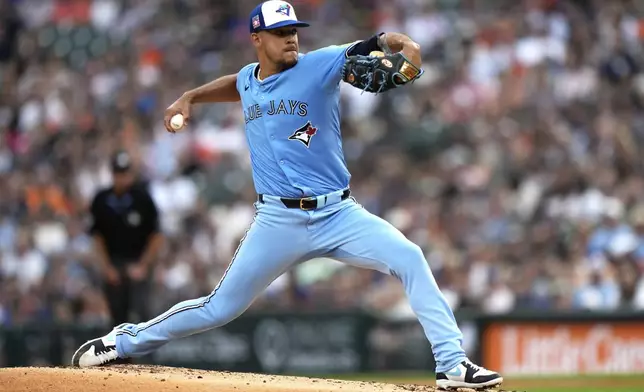 Toronto Blue Jays starting pitcher Jose Berrios throws during the first inning of a baseball game against the Detroit Tigers, Friday, July 25, 2025, in Detroit. (AP Photo/Ryan Sun)