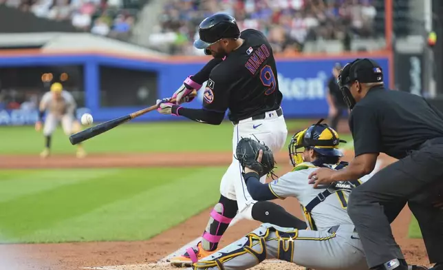 New York Mets' Brandon Nimmo (9) hits a grand slam during the second inning in the second baseball game of a doubleheader against the Milwaukee Brewers Wednesday, July 2, 2025, in New York. (AP Photo/Frank Franklin II)