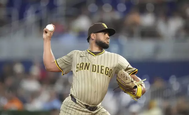 San Diego Padres starting pitcher Randy Vasquez pitches during the second inning of a baseball game against the Miami Marlins, Monday, July 21, 2025, in Miami. (AP Photo/Rebecca Blackwell)