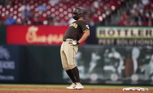 San Diego Padres' Xander Bogaerts reacts after hitting a double during the fifth inning of a baseball game against the St. Louis Cardinals Thursday, July 24, 2025, in St. Louis. (AP Photo/Jeff Roberson)