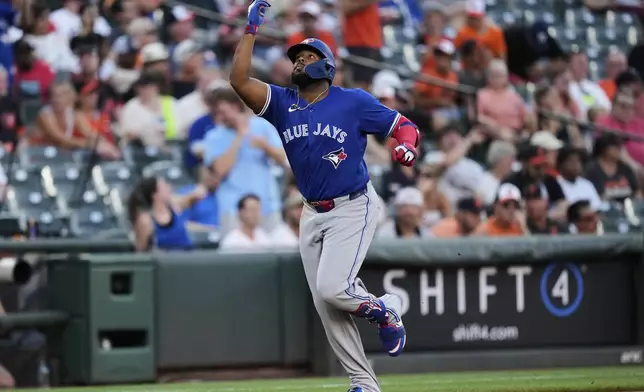 Toronto Blue Jays' Vladimir Guerrero Jr. rounds the bases after hitting a two-run home run during the third inning of a baseball game against the Baltimore Orioles, Monday, July 28, 2025, in Baltimore. (AP Photo/Stephanie Scarbrough)