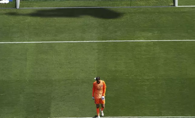 Paris Saint-Germain's goalkeeper Gianluigi Donnarumma (1) reacts after giving up Chelsea's third goal to Joao Pedro (20) during the Club World Cup final soccer match between Chelsea and PSG in East Rutherford, N.J., Sunday, July 13, 2025. (AP Photo/Matt Slocum)