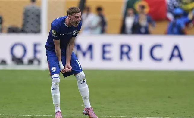 Chelsea's Cole Palmer (10) celebrates winning the Club World Cup final soccer match between Chelsea and PSG in East Rutherford, N.J., Sunday, July 13, 2025. (AP Photo/Seth Wenig)