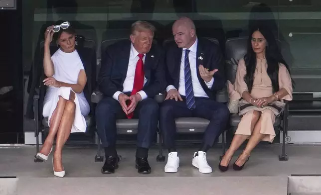 From left: First lady Melania Trump, President Donald Trump, FIFA President Gianni Infantino and his wife Leena Al Ashqar watch the second half during the Club World Cup final soccer match between Chelsea and PSG in East Rutherford, N.J., Sunday, July 13, 2025. (AP Photo/Matt Slocum)