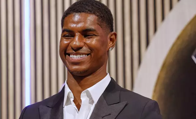 Marcus Rashford smiles during his presentation as a new F.C. Barcelona player in Barcelona, Spain, Wednesday, July 23, 2025. (AP Photo/Joan Monfort)