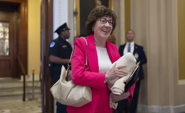 Sen. Susan Collins, R-Maine, chair of the Senate Appropriations Committee, walks from the chamber to his office as Majority Leader John Thune struggles with Republicans, like Collins, who are opposed to President Donald Trump's signature bill of big tax breaks and spending cuts, at the Capitol in Washington, Tuesday, July 1, 2025. (AP Photo/J. Scott Applewhite)